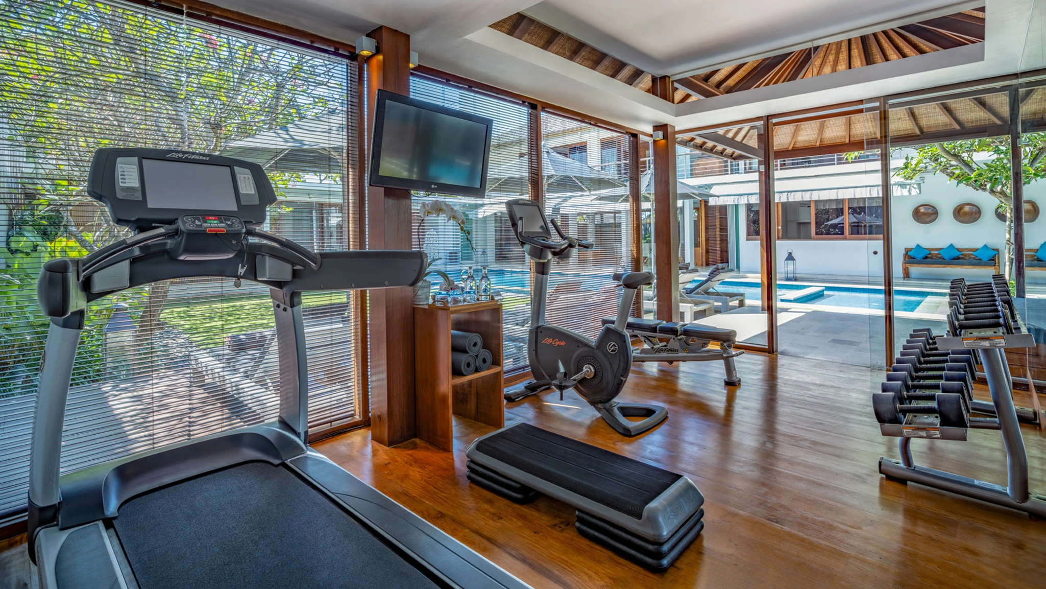 Private gym and expansive pool 